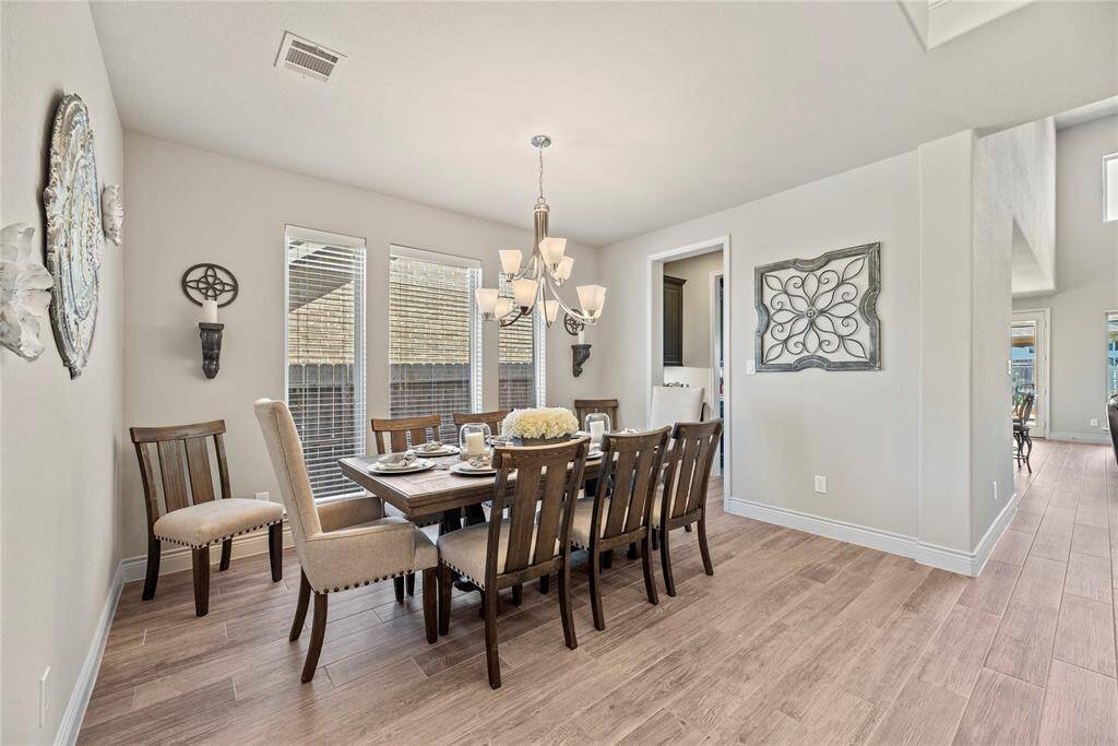 Another view of the large dining room that is perfect for family gatherings.