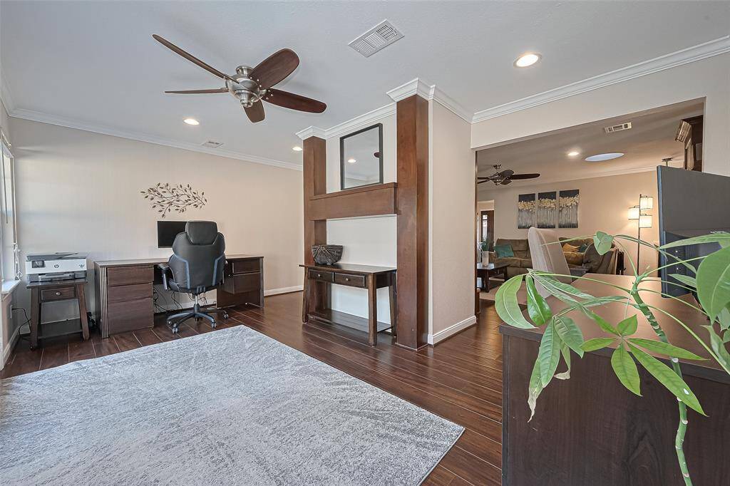 Another view of this flexible space highlights how easily it adapts to your needs. It's perfect as a home office, hobby room, play area, or even a cozy reading nook with a view.