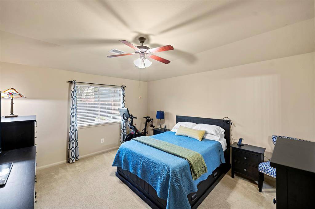 Welcome to the large primary bedroom with fresh paint.