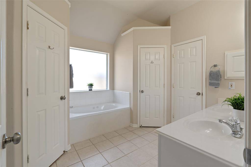 Unwind in the large garden bathtub after a long day.