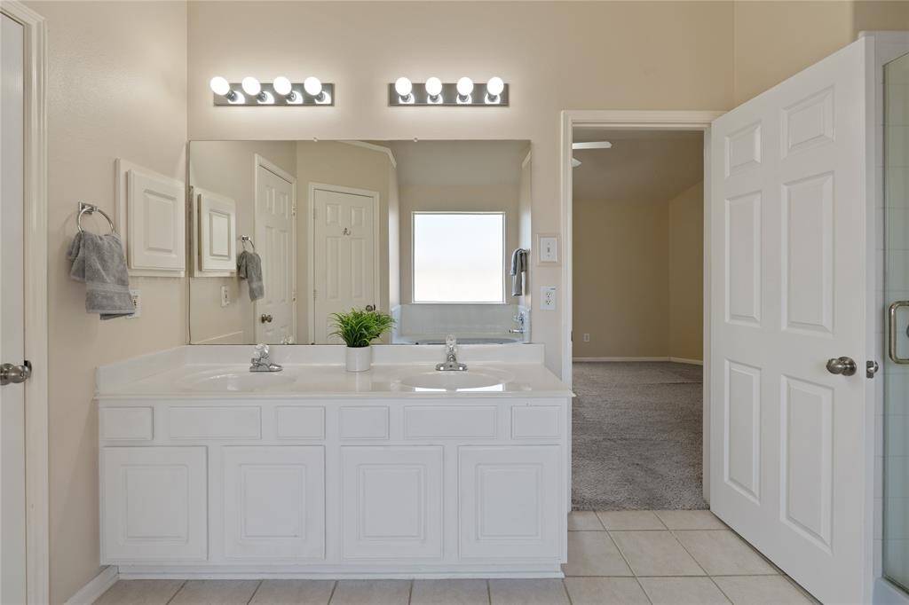 The dual sinks and cabinet space make getting ready for the day a breeze.