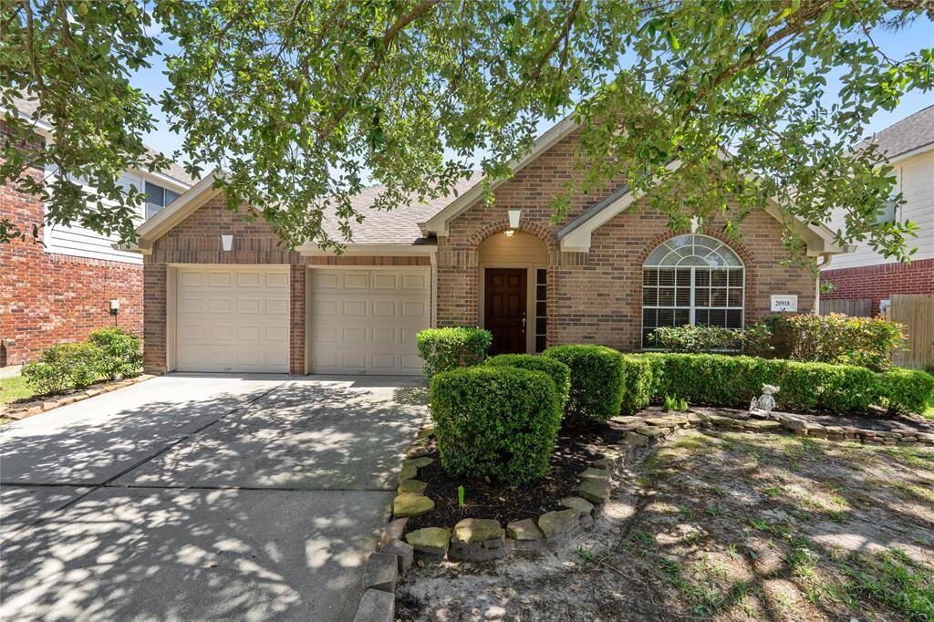 The double-wide driveway gives an extra amount of space for guest to park.