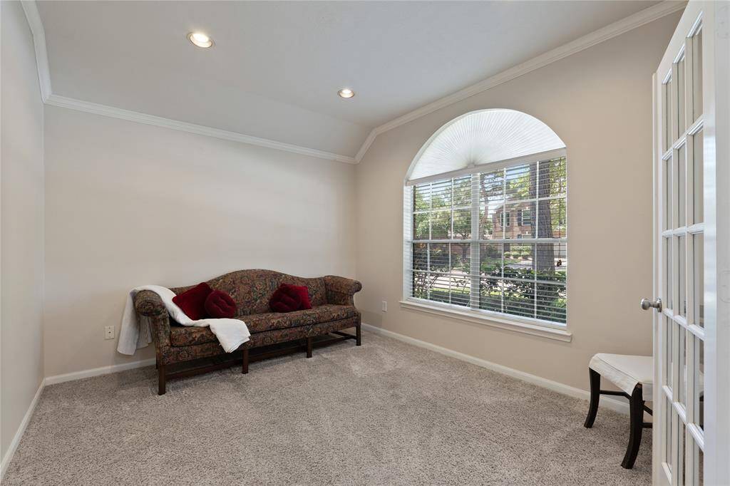 The home office/study offers a large window for enjoying a nice view while working from home.