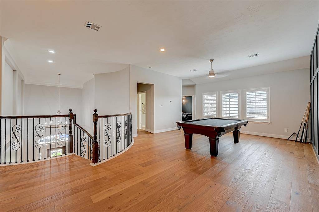 Upstairs you are greeted with the game room.