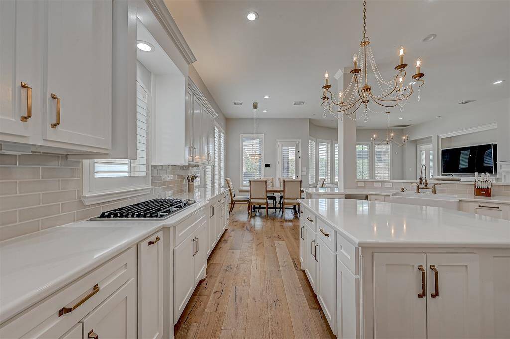 Kitchen flows into eating area.