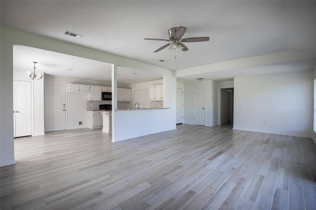 Perfect open floor plan with porcelain throughout to wow your guests