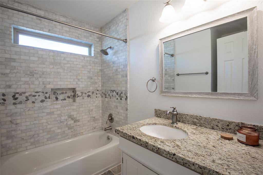 Secondary bath also has the finishing touches of custom features