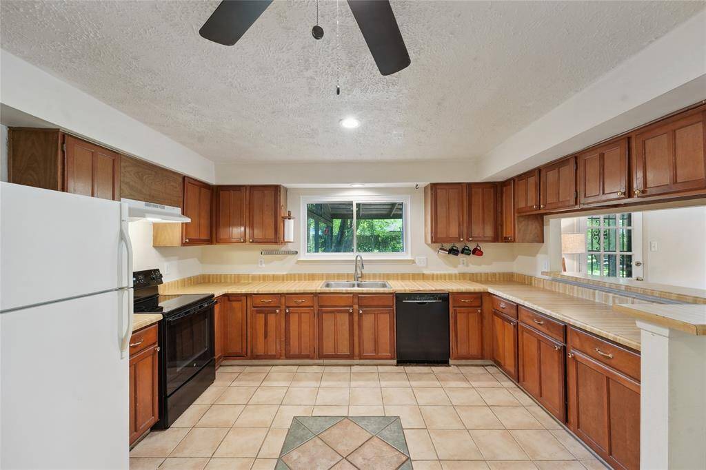 Conveniently located downstairs, the half bath is perfect for guests and everyday use—easily accessible from the main living areas.