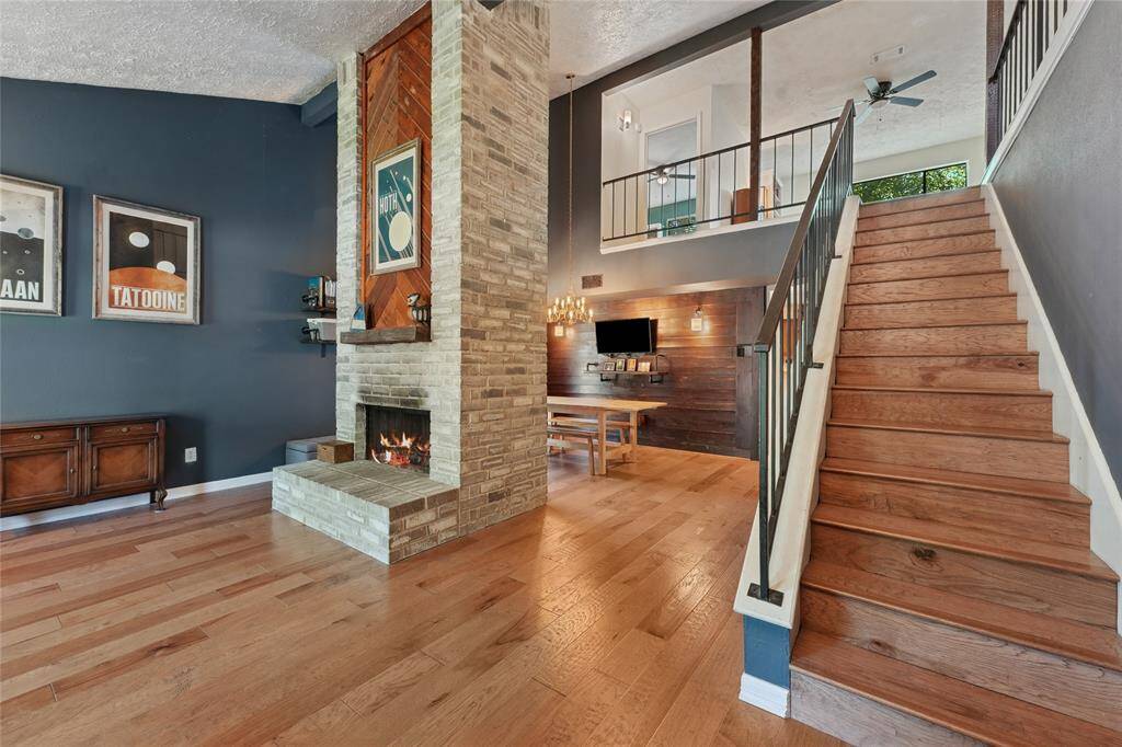 The backyard features a large pond that, with a little TLC, could become a beautiful focal point or relaxing retreat. A great opportunity to add your own touch and bring new life to the space.