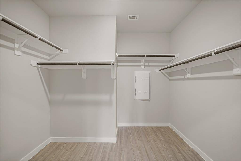 Spacious walk-in closet.