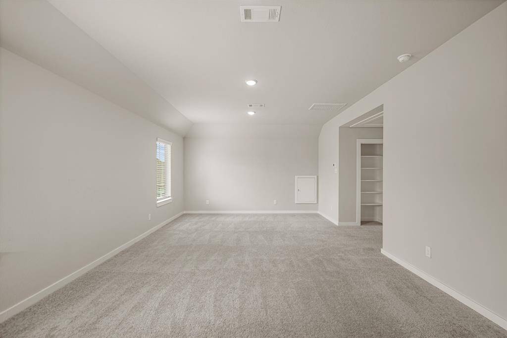 Conveniently upstairs is this huge game room! Convert this space into a kids' hangout, an adults hideaway, or whatever you can imagine!