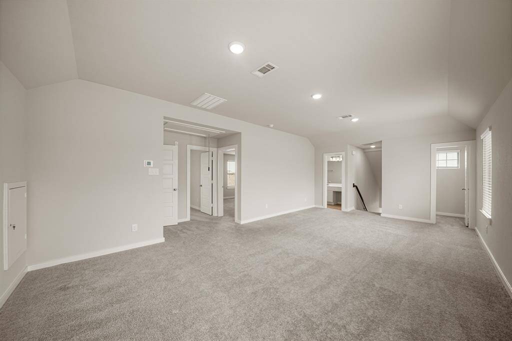 Complete with plush carpet, a small closet, immediate access to a bathroom, and all bedroom upstairs.