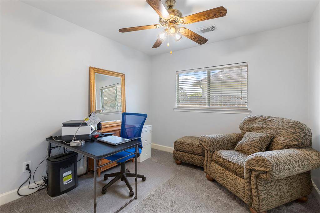 One of two secondary bedrooms provided by this functional floorplan.