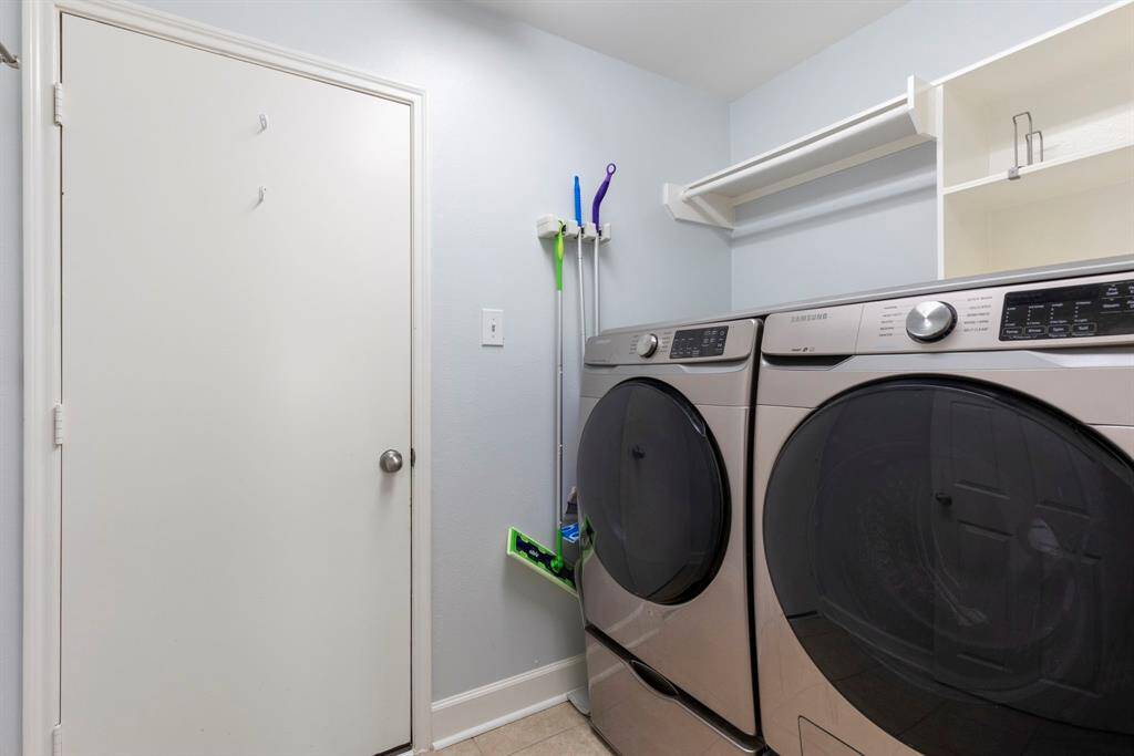 This home provides its own separate utility room with garage access.