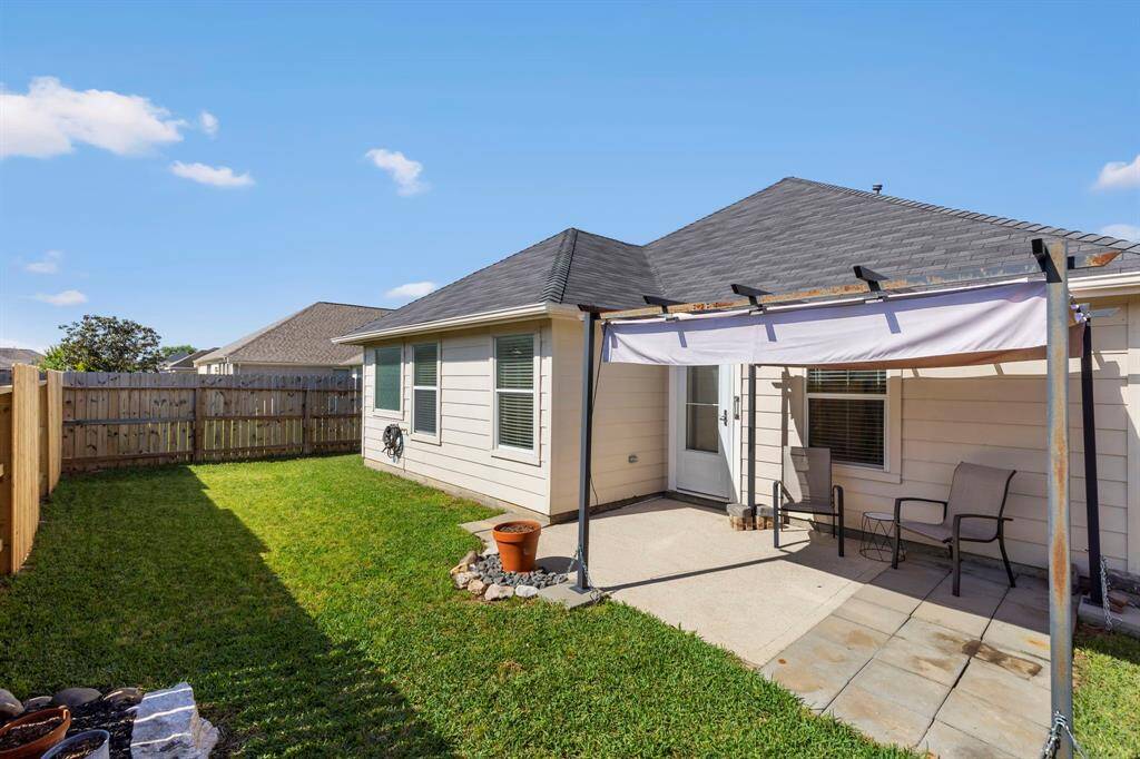Enjoy the morning sunrise in this backyard oasis.