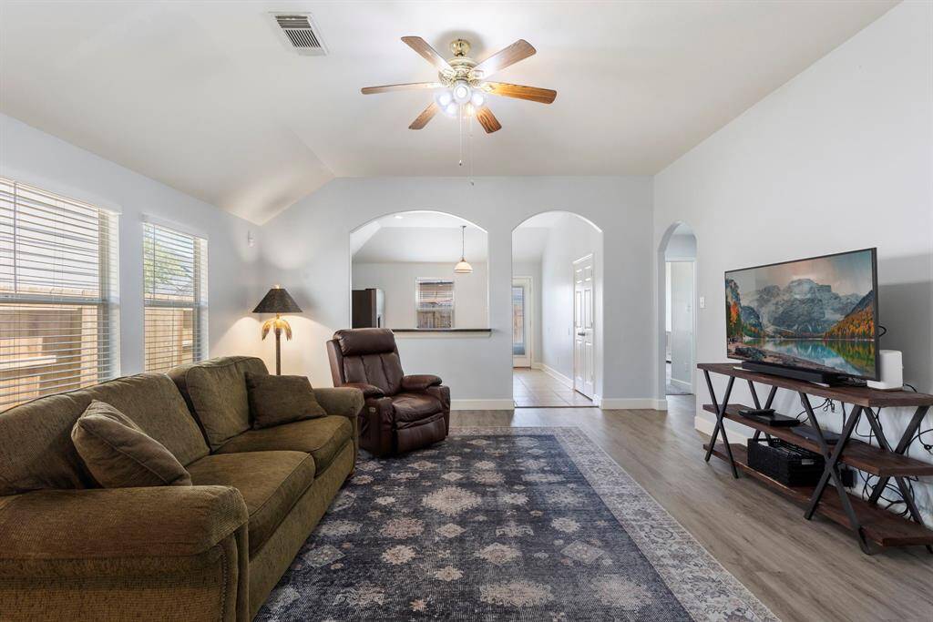 Big open den flooded with natural light.