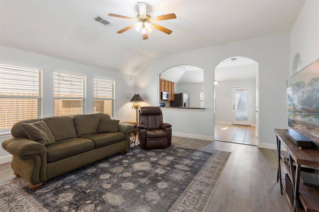 Lovely architectural details throughout and you'll love how the kitchen and den open to each other.