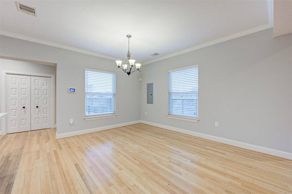 The dining area is large enough for an oversized table and other furnishings