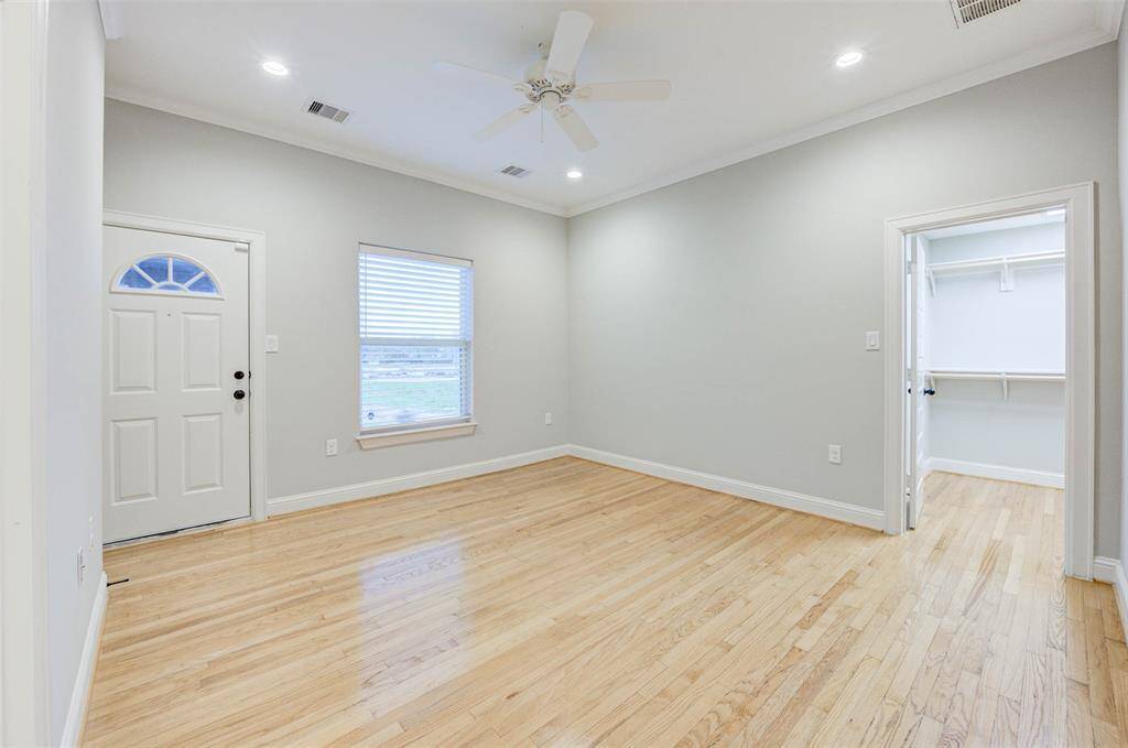 Upstairs bedroom with exterior door to the private balcony