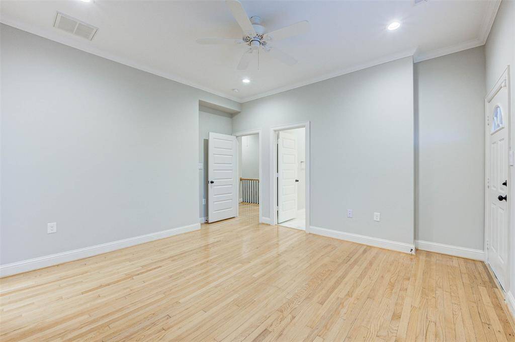 Bedroom has a door that leads to the private upstairs balcony