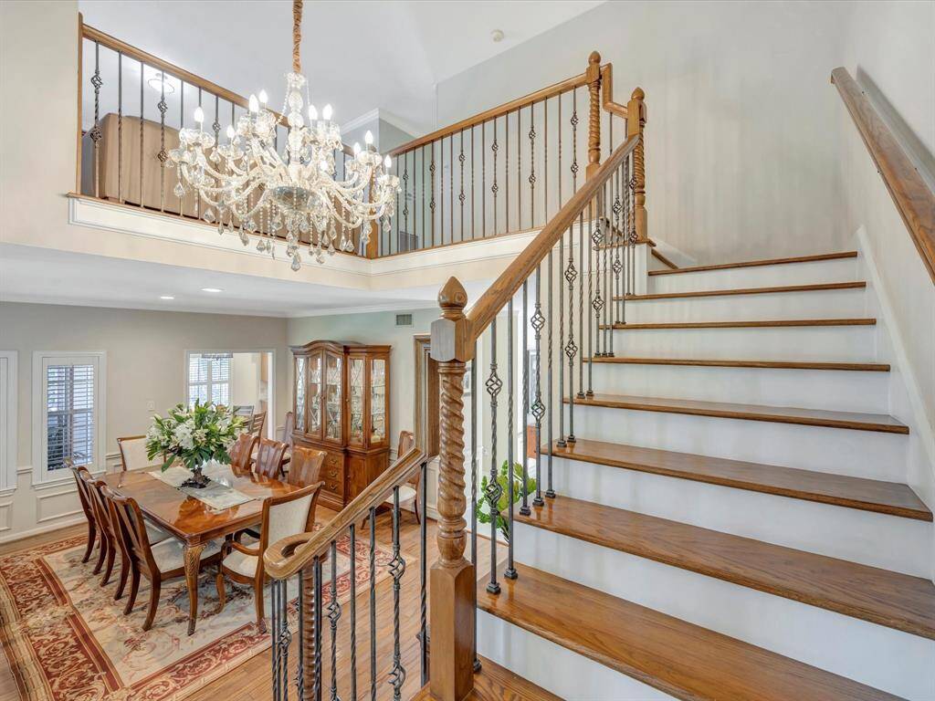 Crystal chandelier has electronic lift to lower for ease of cleaning