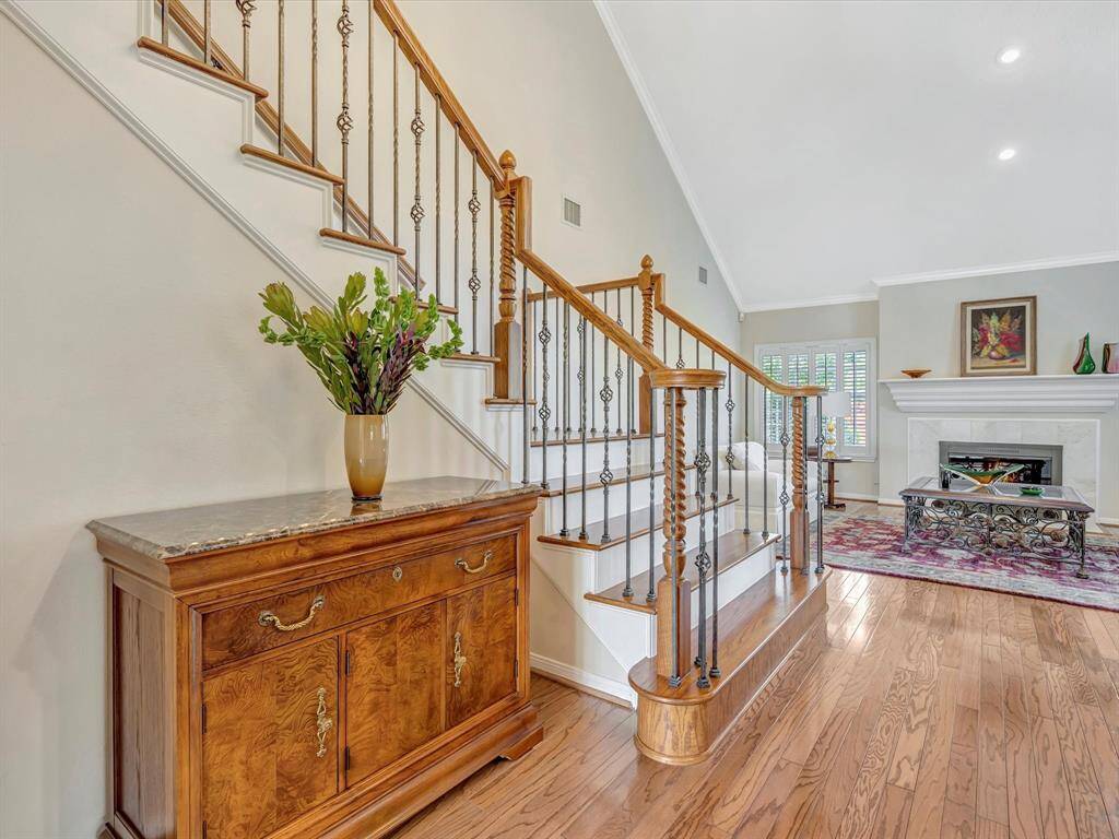 View from front door, staircase was reconfigured from the original floor plan with a customized staircase
