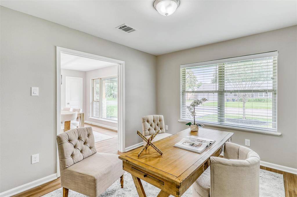Tucked just off the formal dining room, this private study offers a serene setting for remote work, reading, or quiet reflection.
