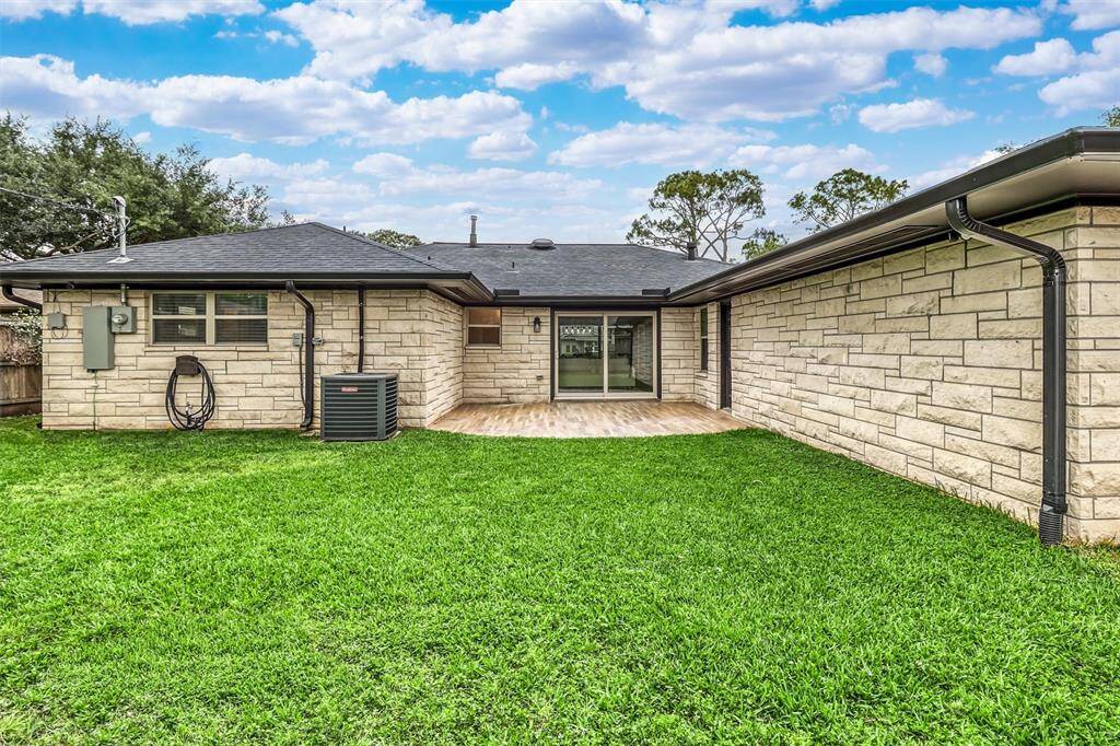 Enjoy a private outdoor oasis with an extended patio, secure fencing, and plenty of green space to make your own.