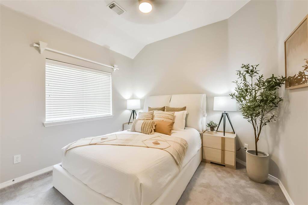 The second bedroom has tall ceilings!