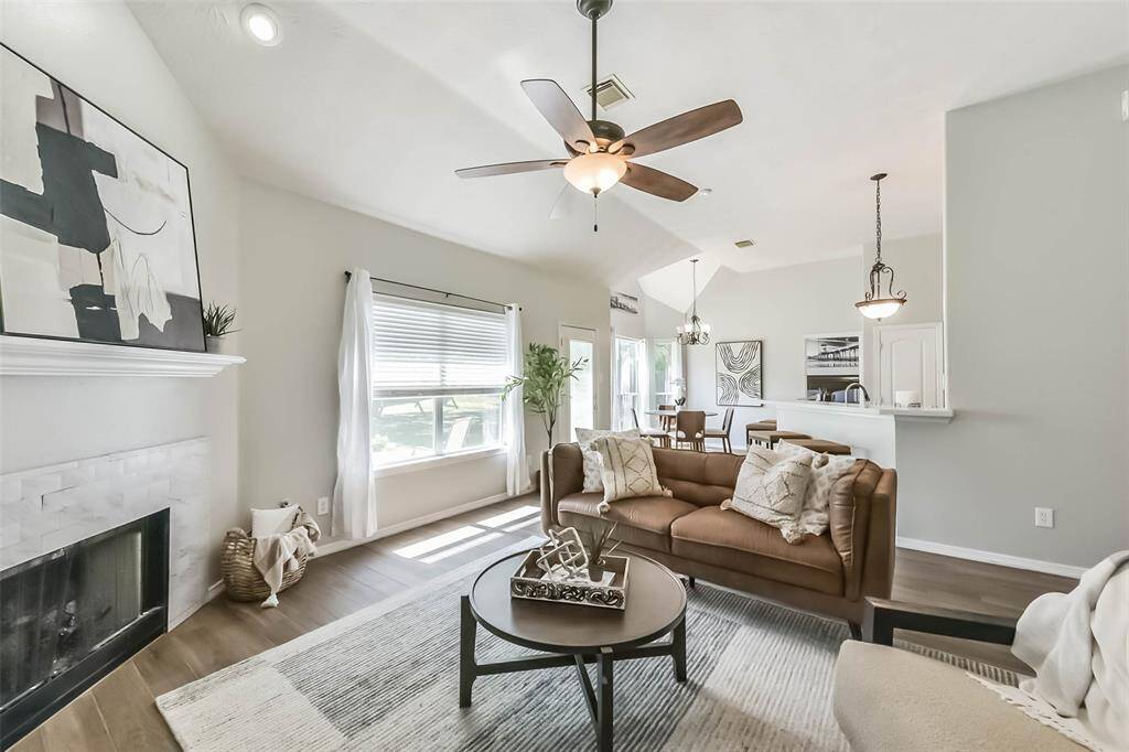 The Open and Bright Living has a perfect flow into the the breakfast and kitchen.