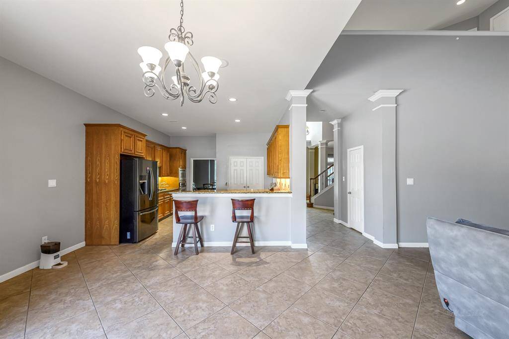 Breakfast bar is a great place for quick meals or to converse with friends while preparing dinner