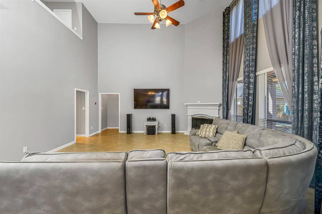 This enormous family room can easily accommodate all your living room furniture