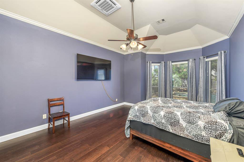 Primary bedroom is spacious enough to hold your king sized furniture and has an added air conditioner for your sleeping comfort