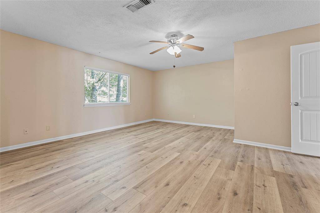 The 3rd bedroom upstairs is large, light and bright with new flooring as well!