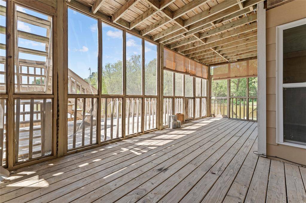 Enclosed porch downstairs off the living room.