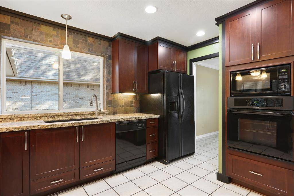 The dishwasher and oven were replaced in the last few years and the refrigerator will convey with the home.