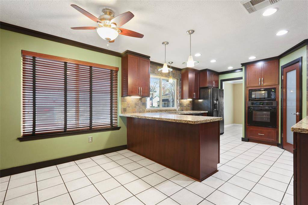 Breakfast room and breakfast bar offer space for enjoying family and friends.