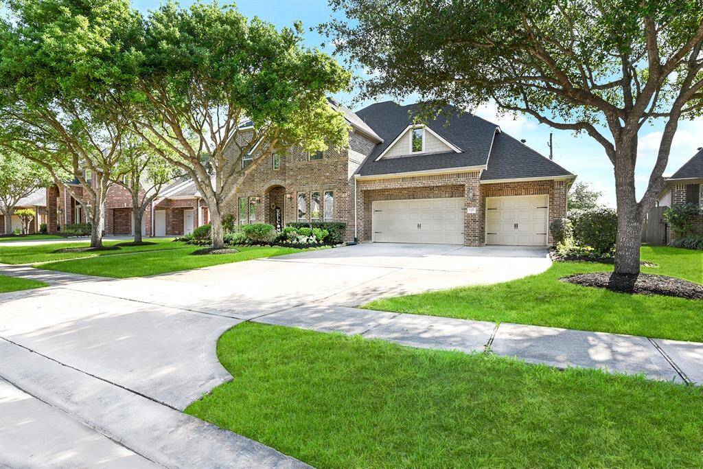 This amazing home is nestled in the highly sought-after neighborhood featuring sidewalks throughout and plenty of amenities for residents to enjoy. The property offers a rare 4.5-car garage with a drive-through bay leading to the backyard—perfect for easy access or storing extra vehicles, boats, or trailers. There’s even room to add a pool in the expansive yard!