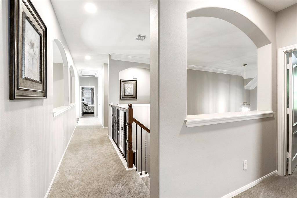 Upstairs, you’ll find an amazing layout with a split floor plan that offers privacy between the bedrooms and entertainment areas—perfect for families or guests seeking their own space while still enjoying shared living spaces.