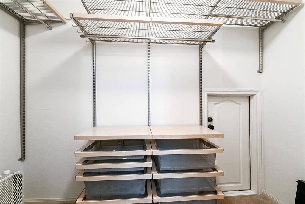 Huge WALK IN closet space. Upstairs offers plenty of storage space, complete with custom closet kits that will stay with the home, providing added organization and convenience.