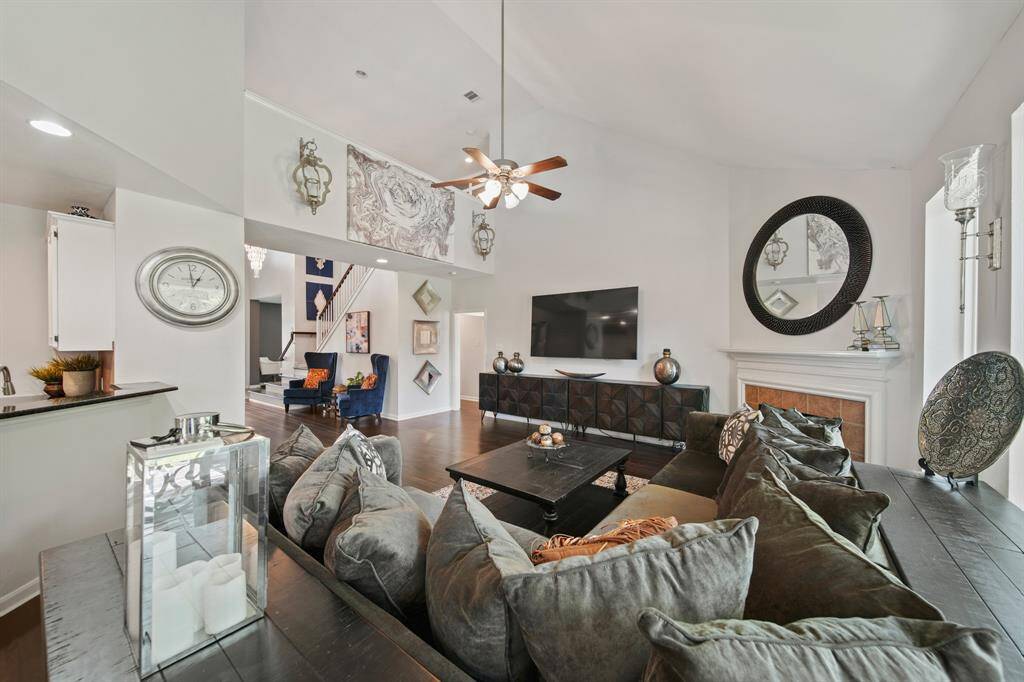 The open-concept layout connects the family room to the casual dining area and kitchen, creating the perfect space for entertaining and everyday living.