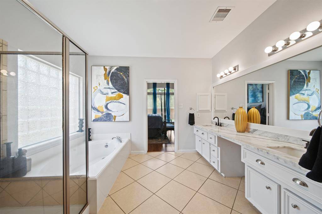 With calming tones, upgraded lighting, and thoughtful finishes throughout, this ensuite offers both function and indulgence in equal measure.