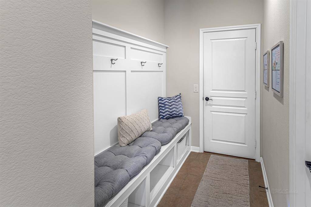 Primary bath also has a large soaking tub and extra shower