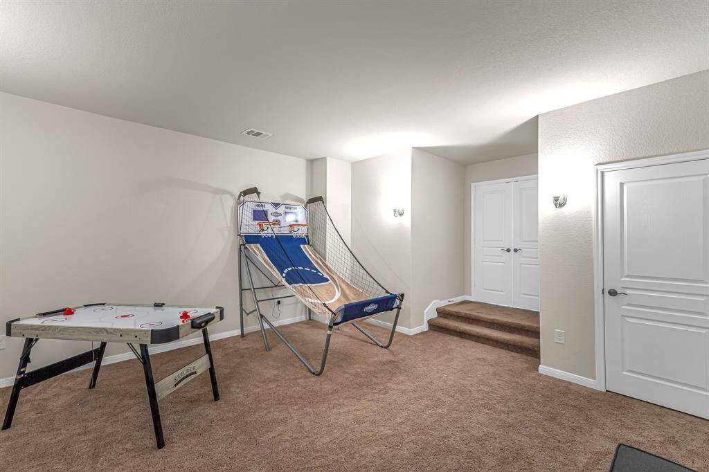 The media room off of the game room is being used as a play area!