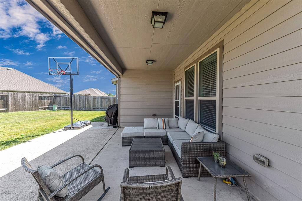 Covered back patio perfect for entertaining