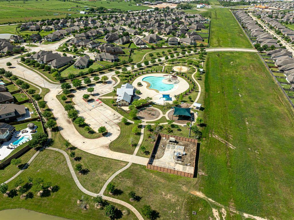 View of home and surrounding community w/lakes and walking trails!