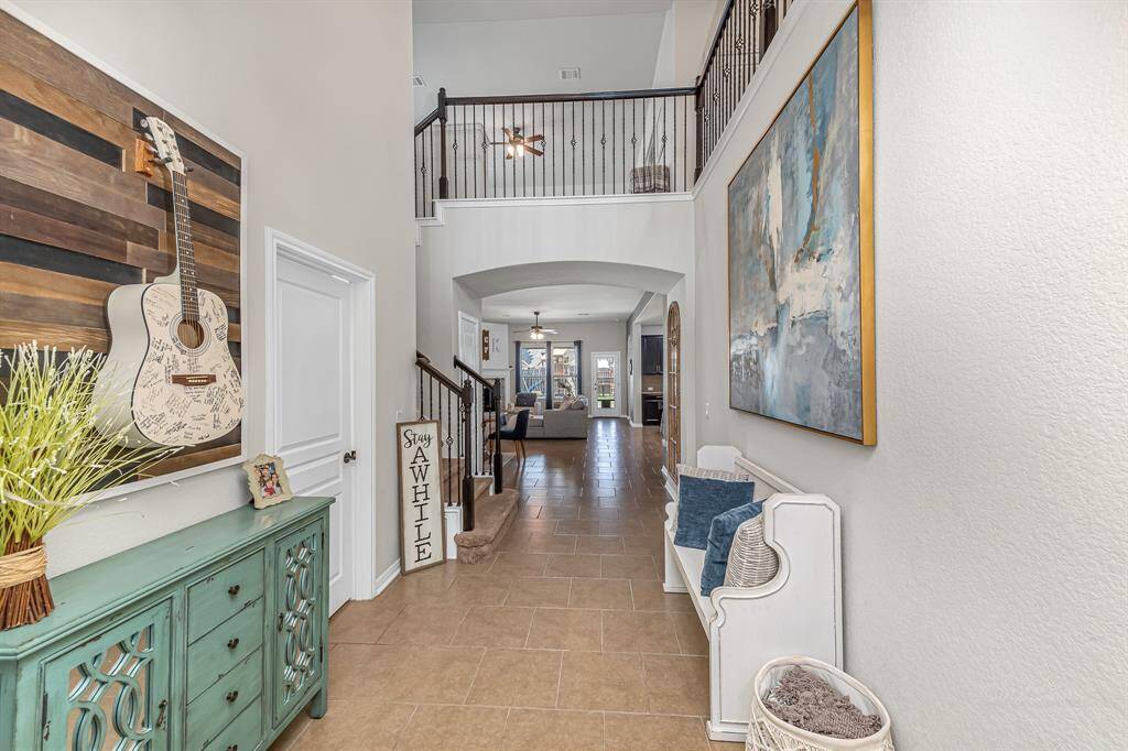 Office with french doors off of entry