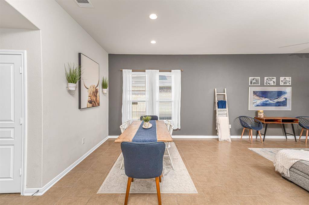 Living room w/updated tile and shiplap on the fireplace