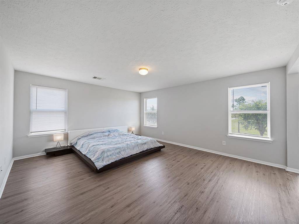 Primary Bedroom! Imagine the possibilities with all of this space.