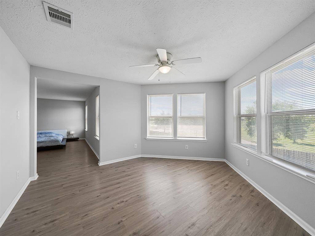 Additional space with-in the primary bedroom. Perfect for reading space or other needs.
